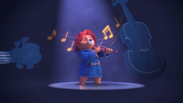 Paddington joue dans un groupe