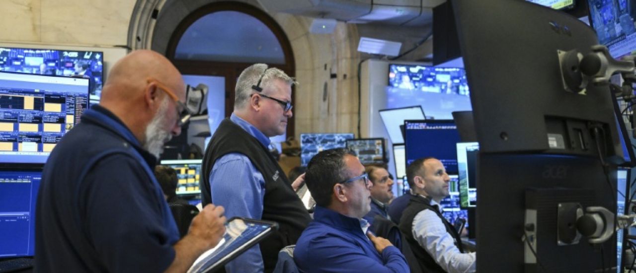 Wall Street clôture en nette hausse, record du Dow Jones